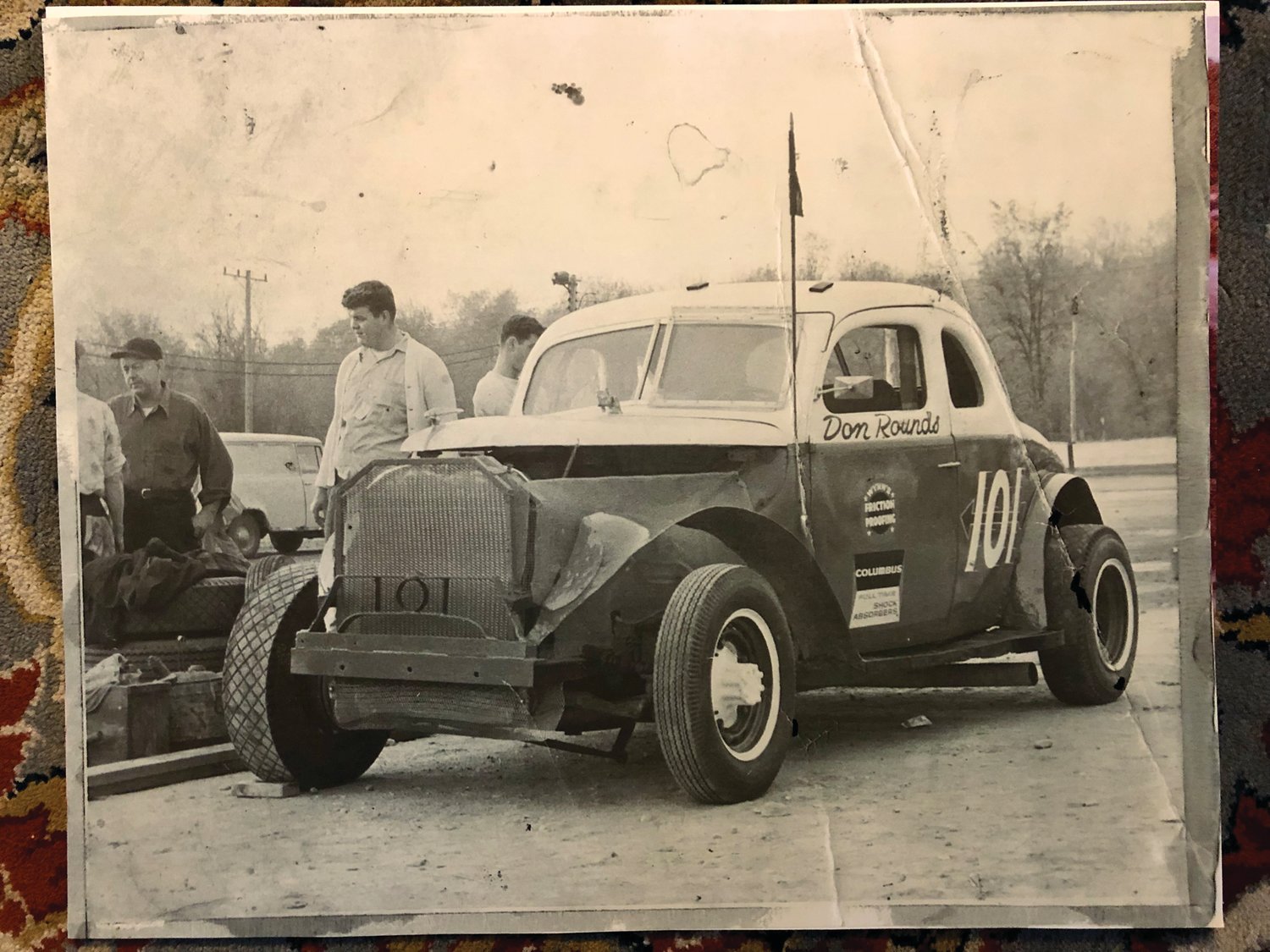“Big Wayne” Voelker, beside the 101, provided ground support at the races. “He carried the jack, changed all the tires around, and warmed it up,” recalls Billy Rounds.